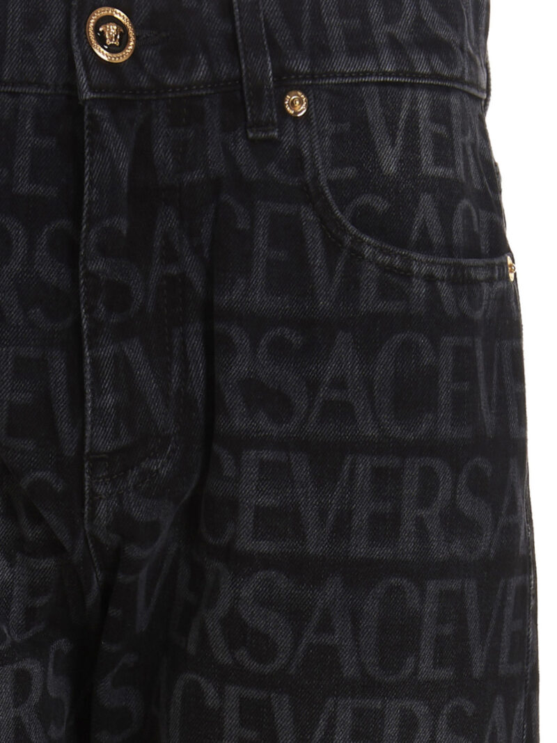 Logo print jeans Man VERSACE Black