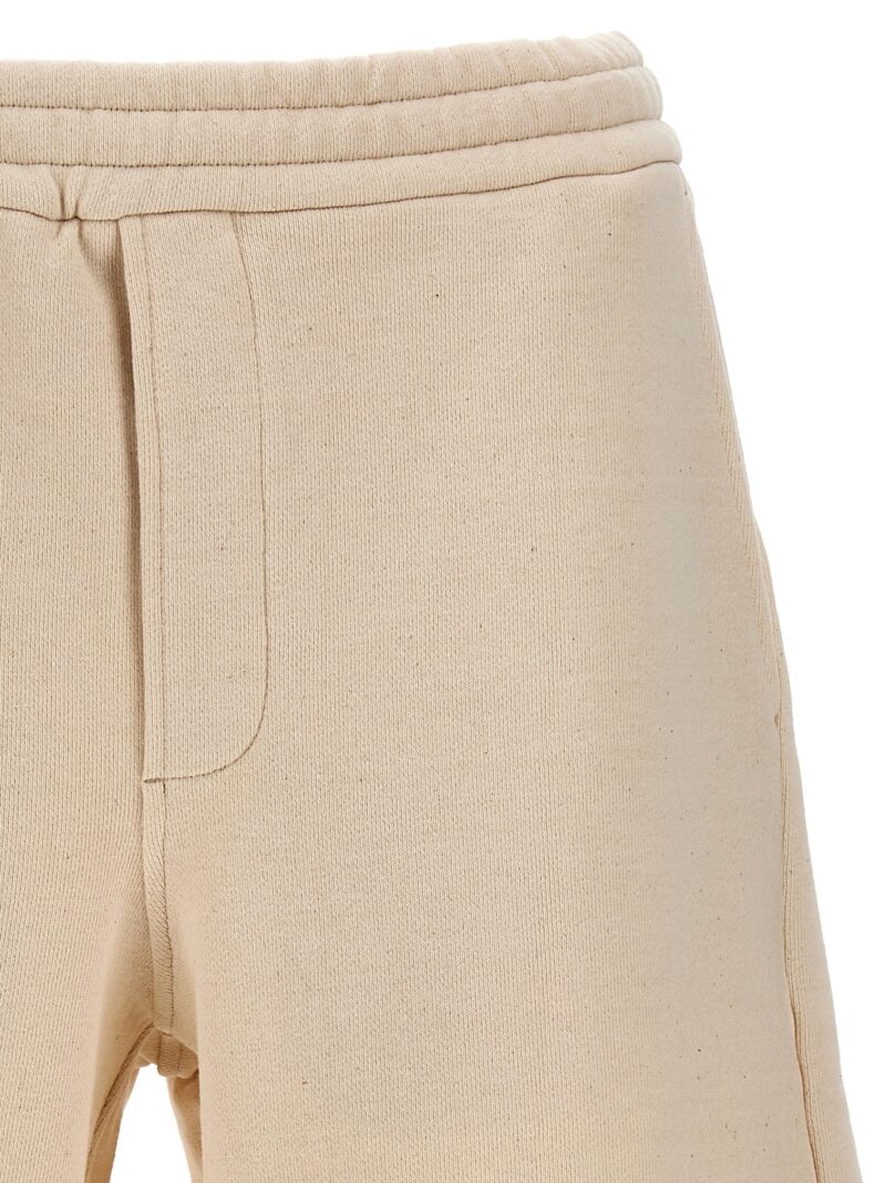 Triangle logo bermuda shorts Man PRADA Beige