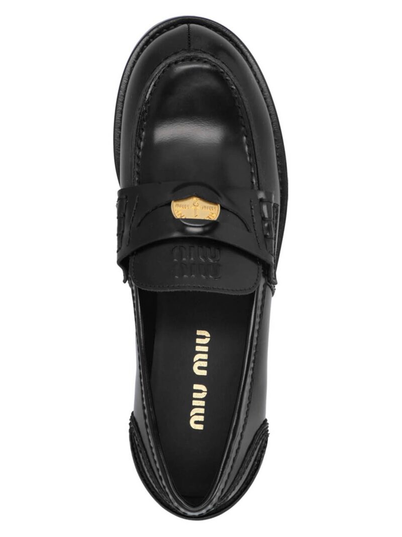 Penny loafers 100% leather MIU MIU Black