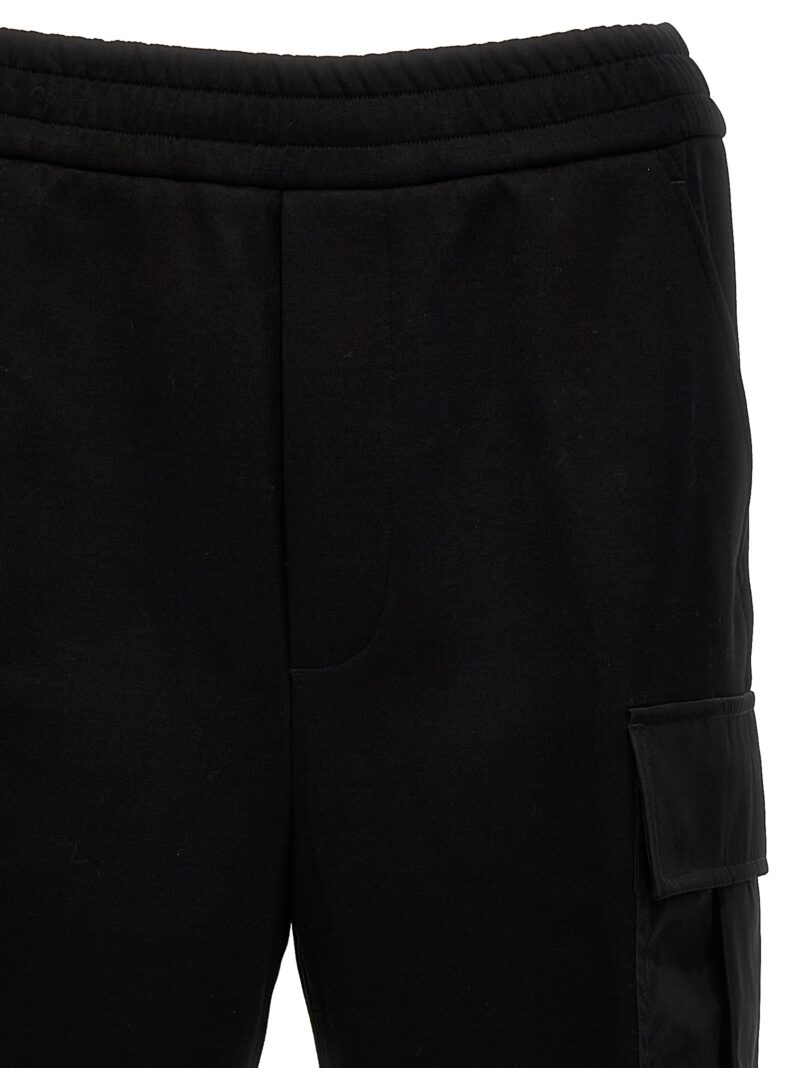 Nylon insert cargo joggers Man PRADA Black